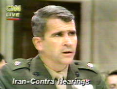 Photo of Olliver North testifying at the Iran Contra Hearings